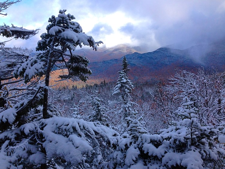 The fall colors of the Adirondacks were visible through the snow-covered trees on the trail to Street and Nye Mountains.